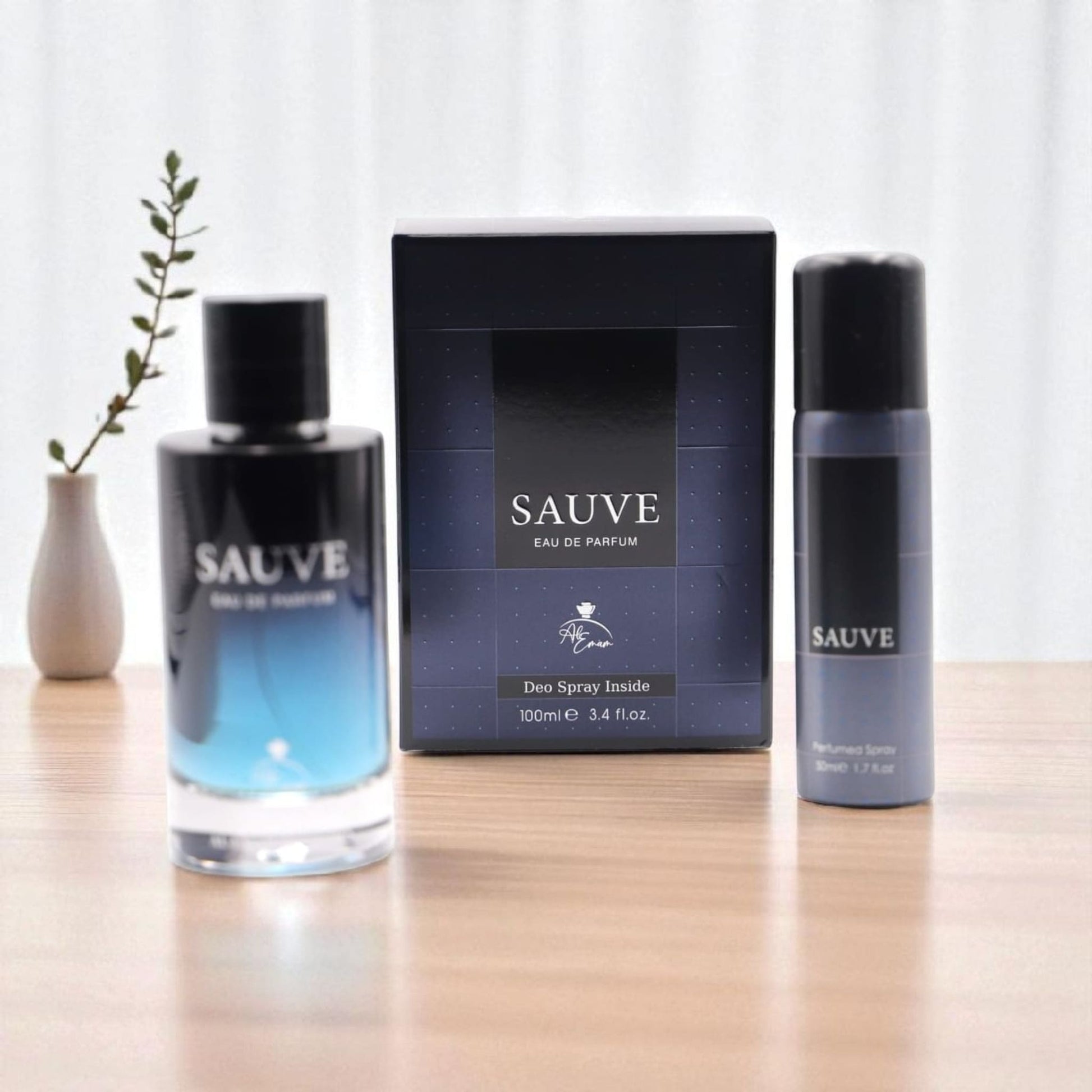 Sauve perfume and deodorant set on a wooden surface with a white background