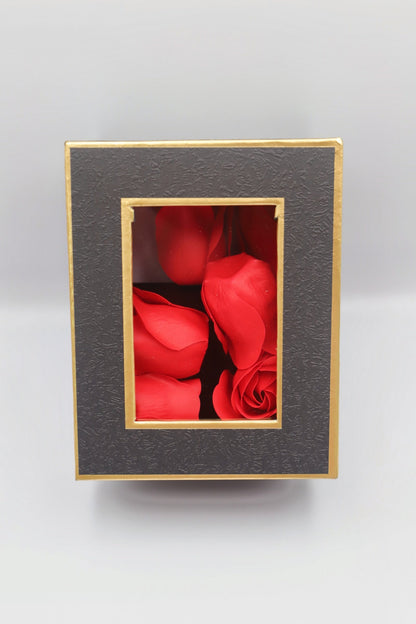 Black gift box red petals